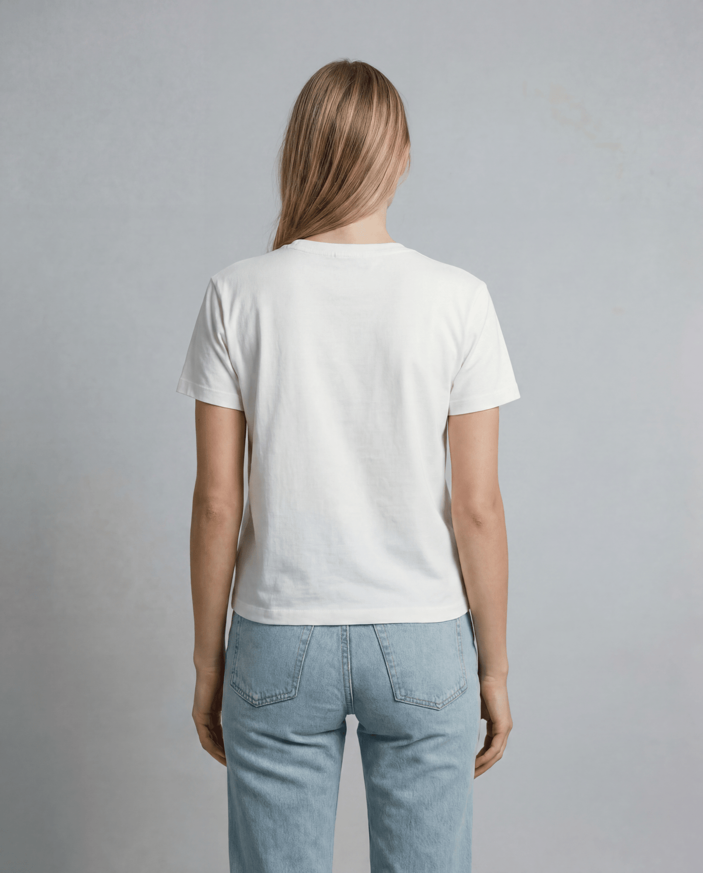 Boxy everyday tee, white short-sleeve T-shirt from the back with crew neckline.