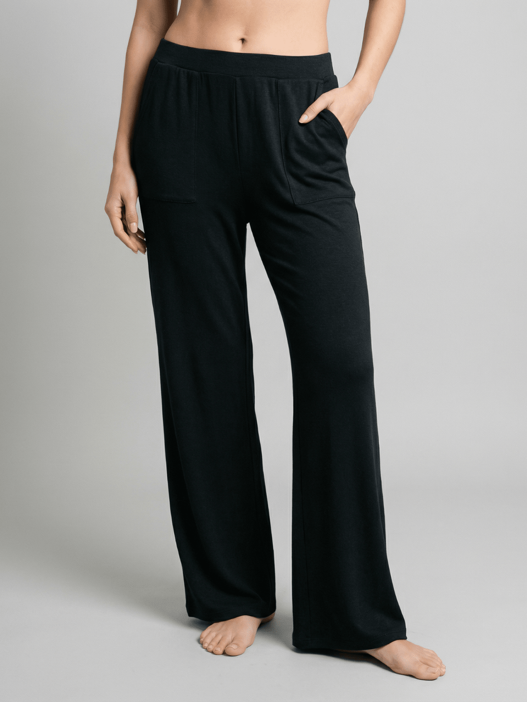 Dark green wide-leg pajama pants with relaxed waistband and side pockets