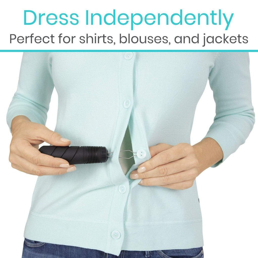 Black button hook used to fasten a button on a light blue shirt