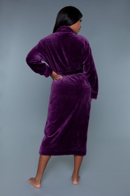 Plush robe, purple long sleeves, belt tie at waist, side back view