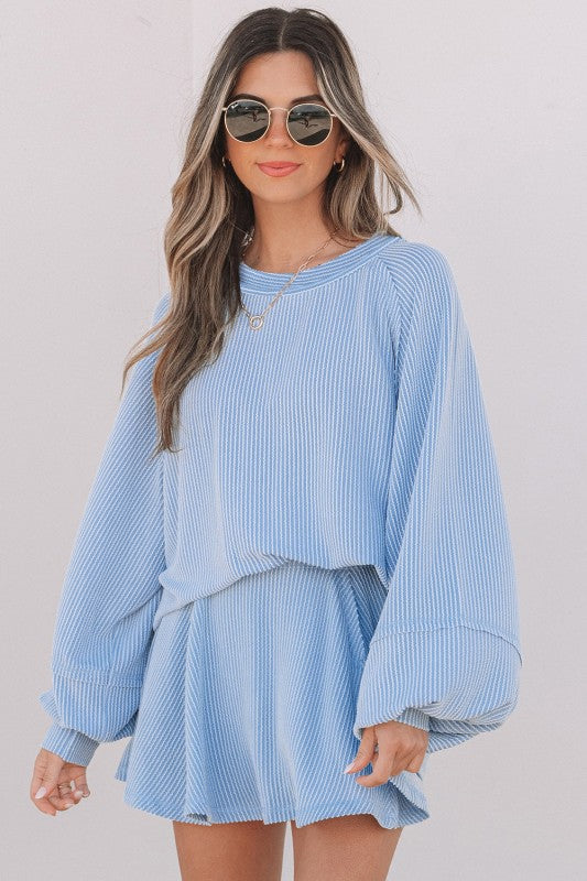 Light blue corded top and ruffle mini skirt set, long sleeves and gathered waist