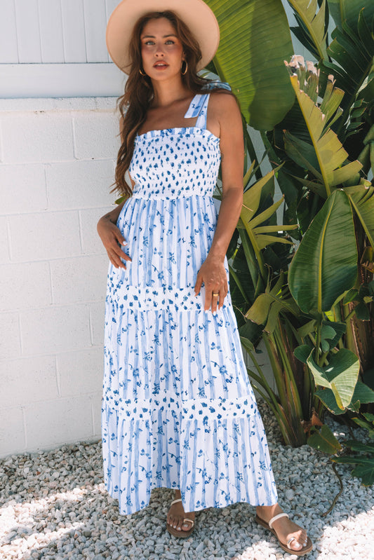 Sky blue floral tiered maxi dress with smocked bodice and sleeveless tie straps