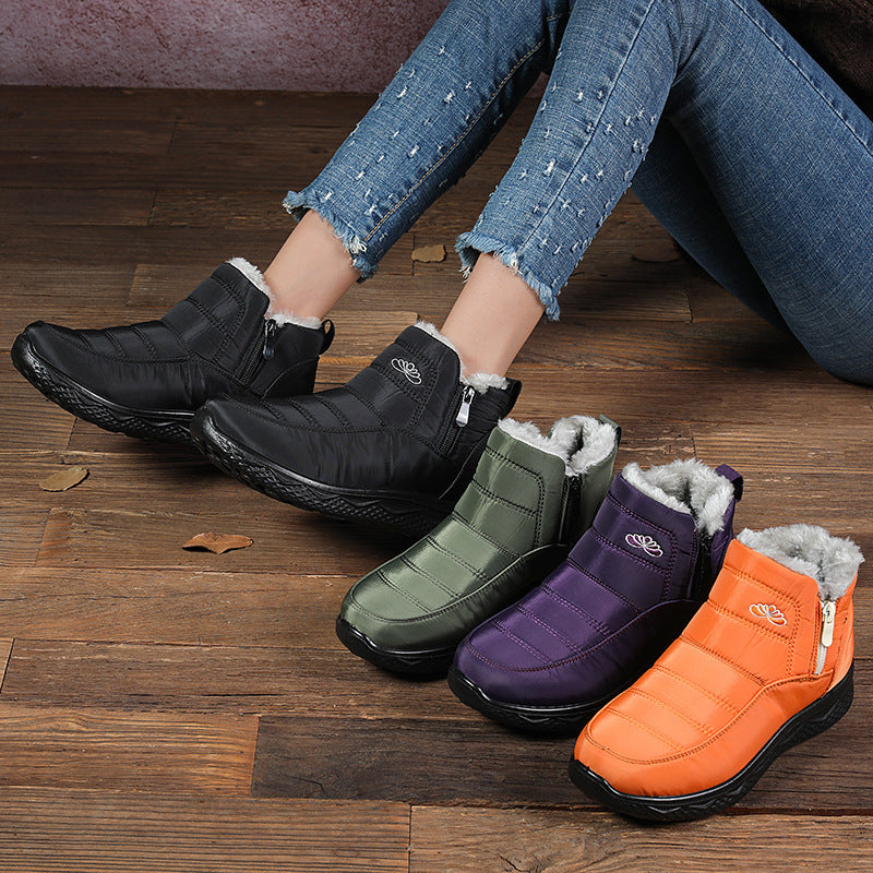 Women’s ankle snow boots, black, green, purple, and orange pair lineup with fur trim