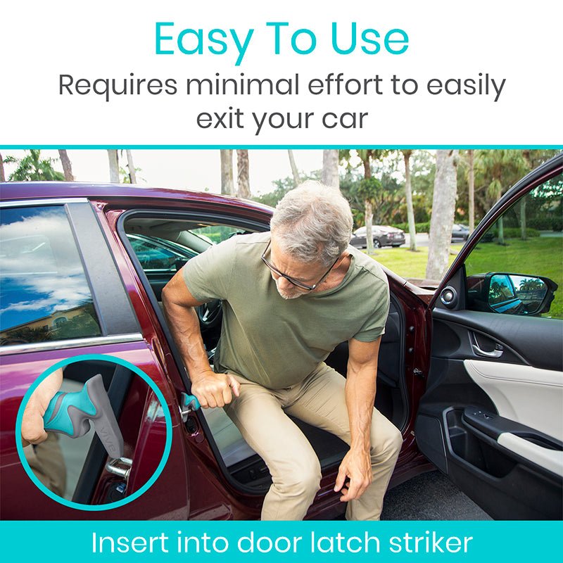 Teal and gray car assist handle inserted at door latch area