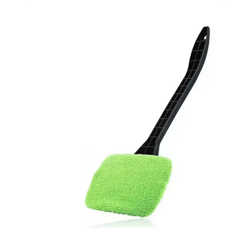 Car window cleaning brush with light green microfiber pad and black grid scraper edge