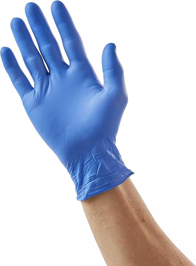 Blue nitrile exam glove on hand, single glove