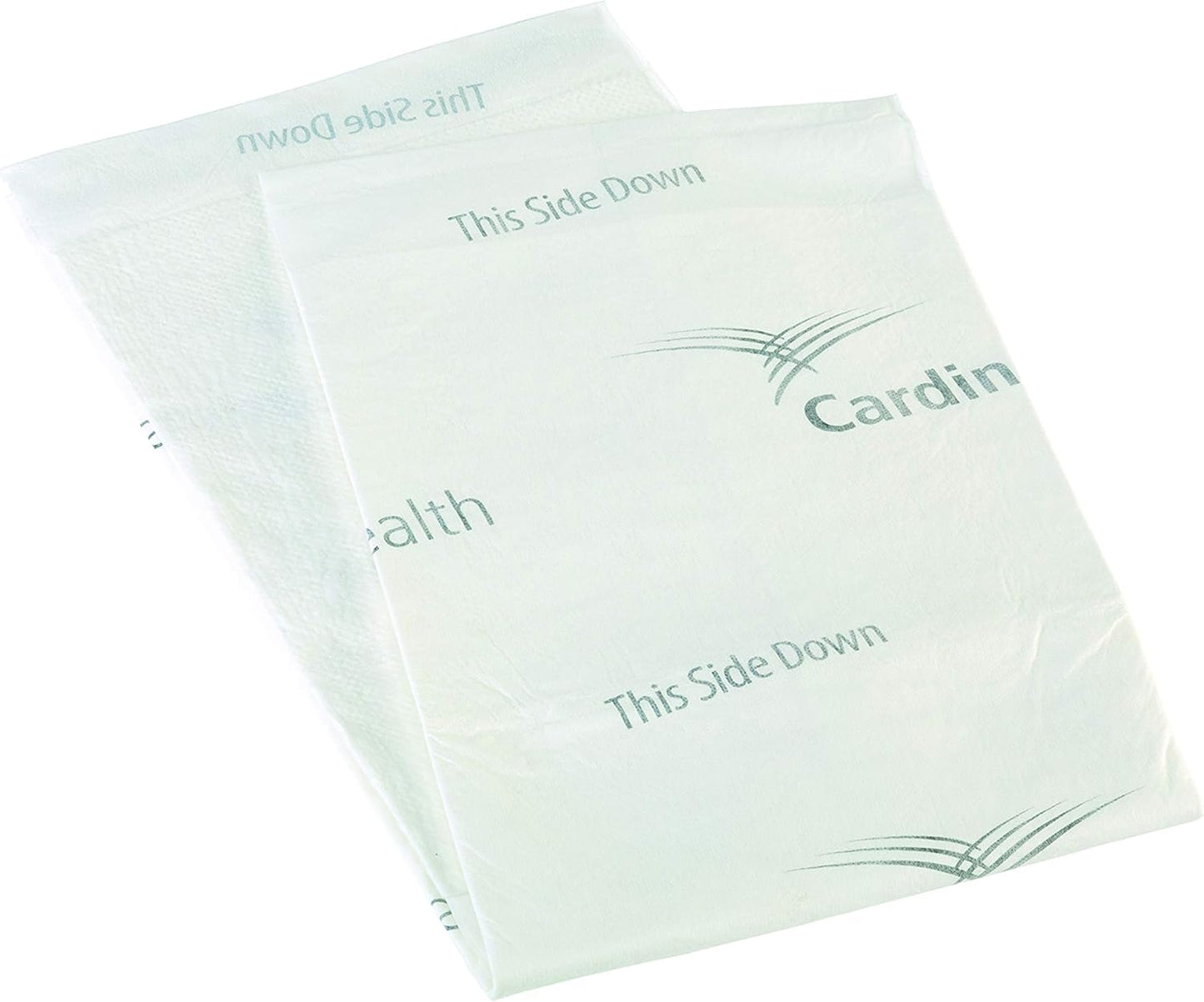 Wings premium comfort underpads, white absorbent pad with “This side down” markings