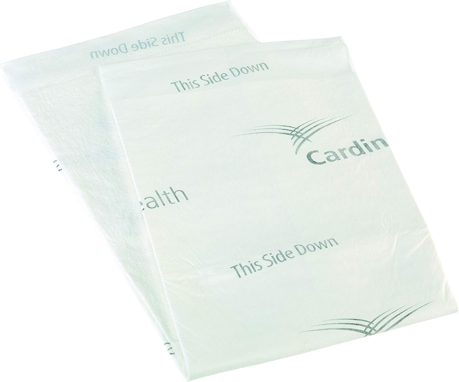 Wings premium comfort underpads, white absorbent pad with “This side down” markings