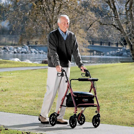 Rolling walker with burgundy frame and black seat, four caster wheels