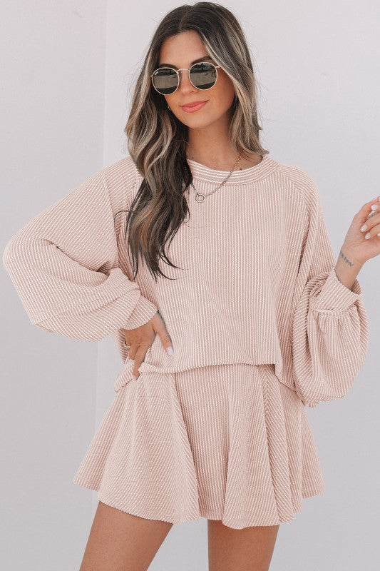 Corded top and ruffle mini skirt set in blush pink, long sleeves and pleated skirt