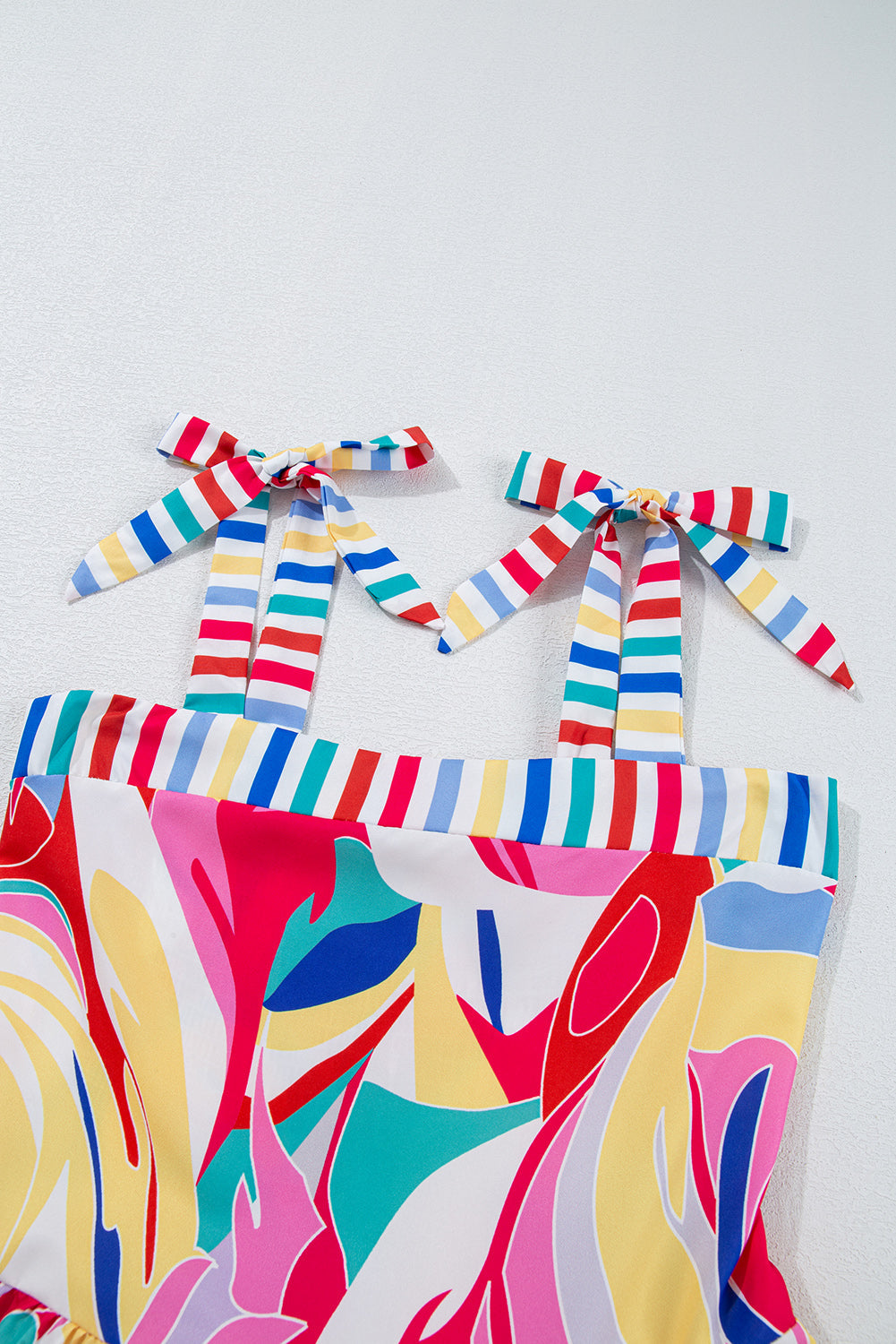 Multicolor maxi sundress fabric detail with striped shoulder bows and trim
