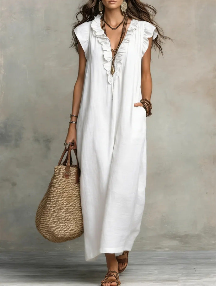 White sleeveless maxi dress with ruffle neckline and keyhole button front