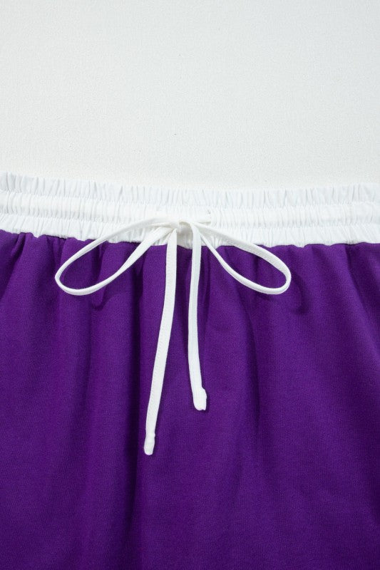 Purple mini skirt with white drawstring and elastic waist