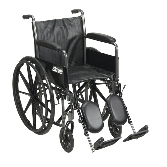 Wheelchair with padded full armrests and elevating leg rests, large rear wheels
