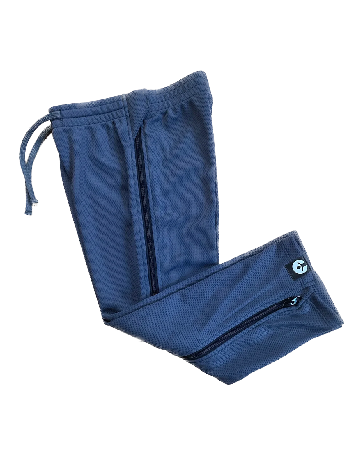 Blue athletic pants with drawstring and zippers on a white background