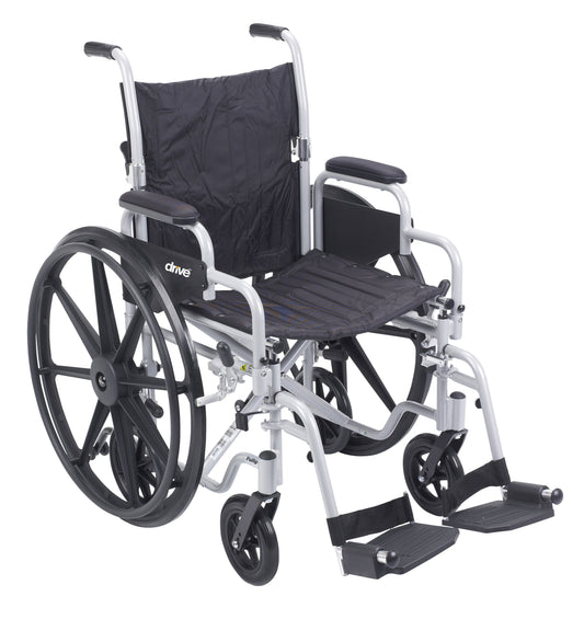 Lightweight transport wheelchair with swing-away footrests and padded black seat