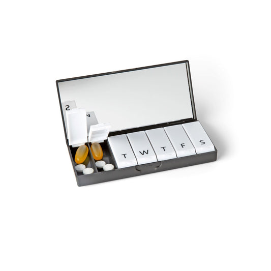 Black rectangular pill box open, showing divided compartments and X mark