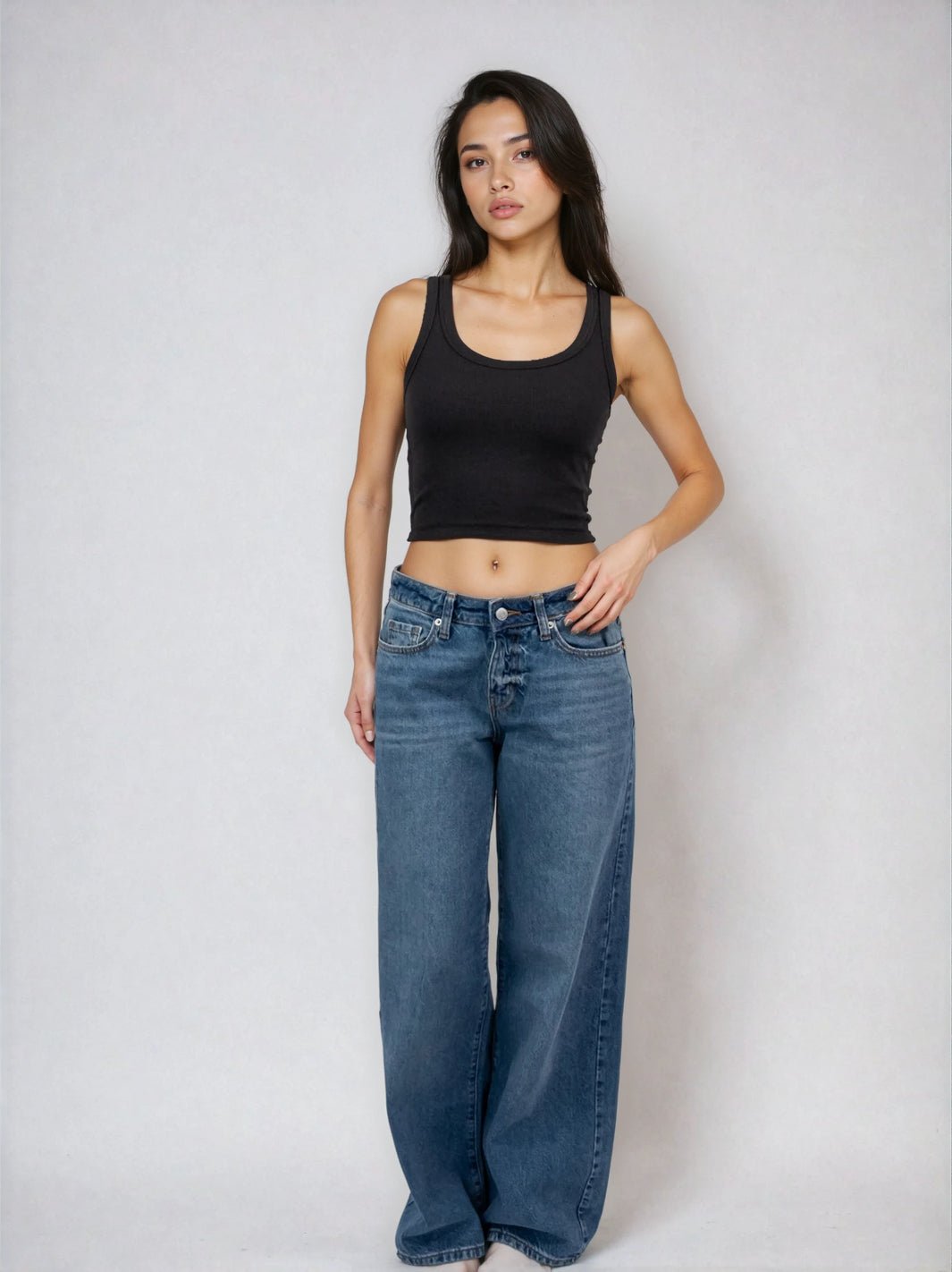 Black cropped ribbed tank top with scoop neckline and wide shoulder straps