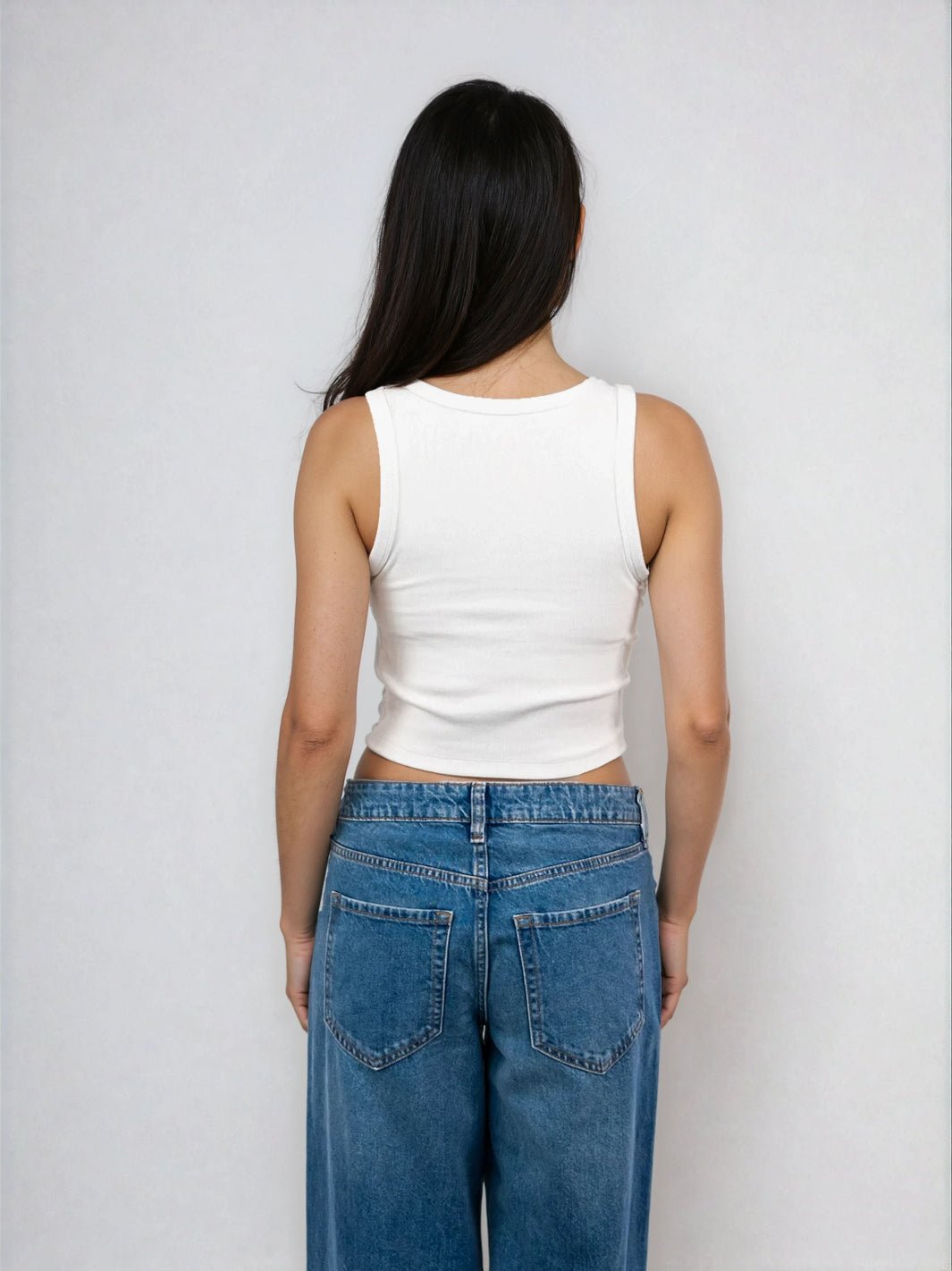 White cropped ribbed tank back view with racerback straps