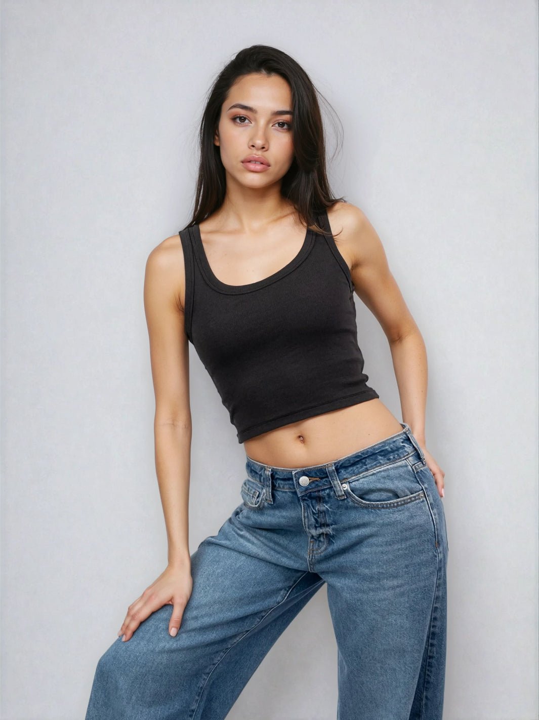 Black cropped ribbed tank top with scoop neckline and wide straps, fitted silhouette