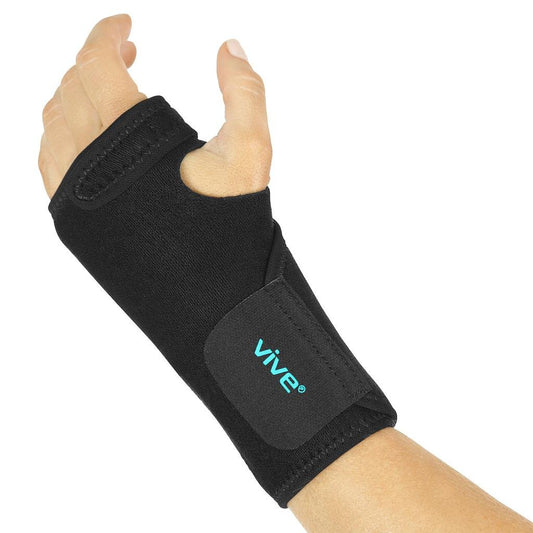 Black wrist brace with thumb loop, Velcro strap, and cushioned palm insert