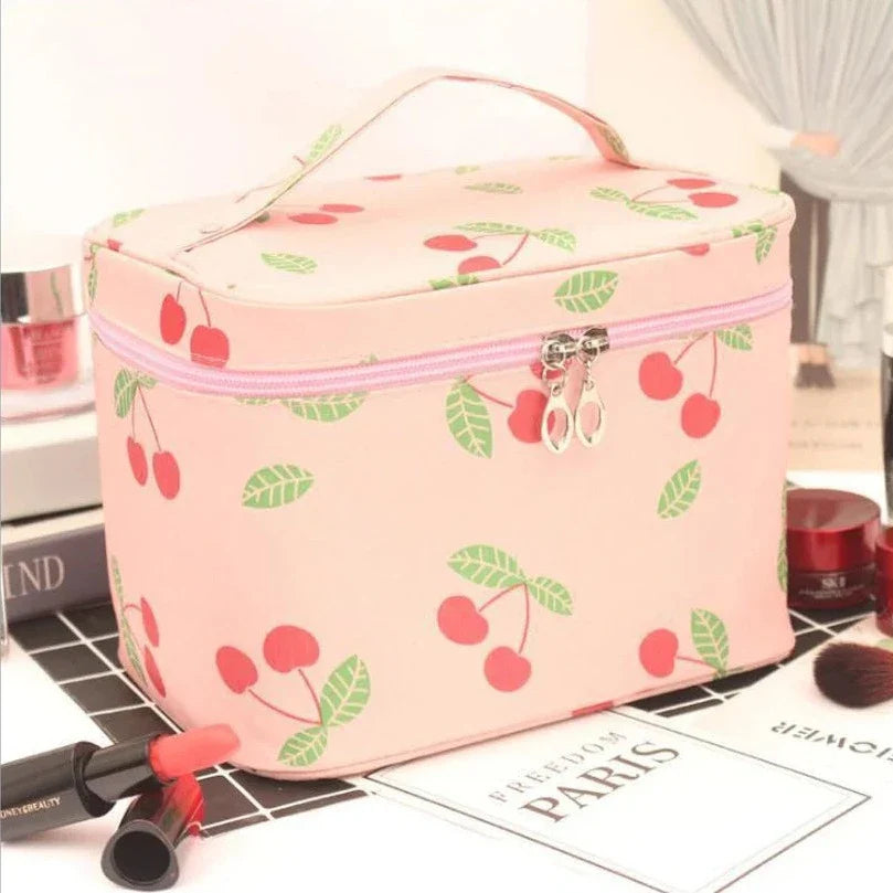 Pink cherry print cosmetics toiletry bag with top handle and zip closure