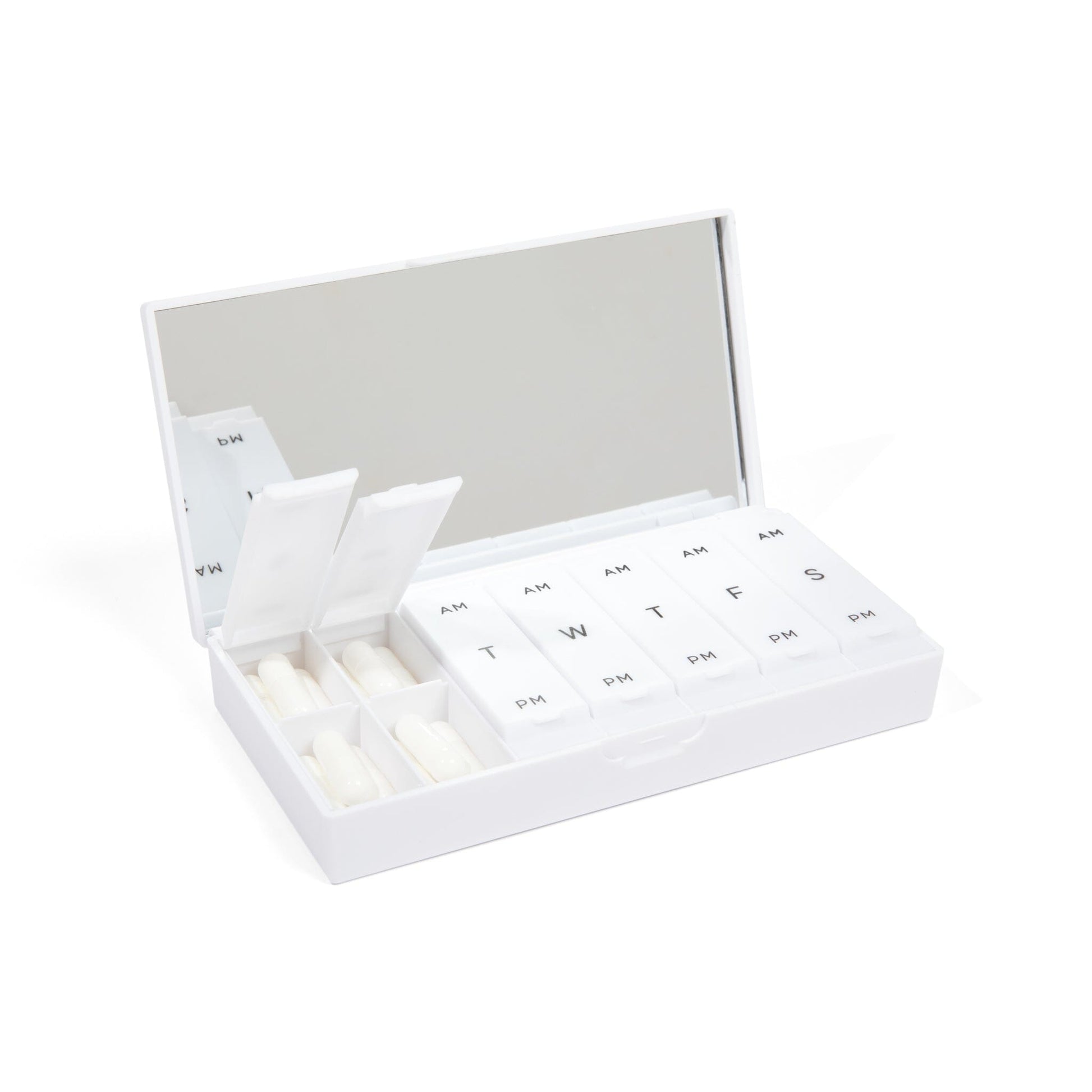 White AM/PM pill box with open lid and labeled daily compartments