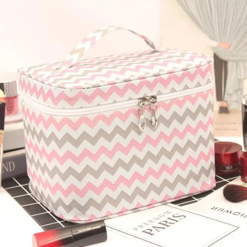 Pink and grey chevron cosmetics toiletry bag with top handle and zip closure