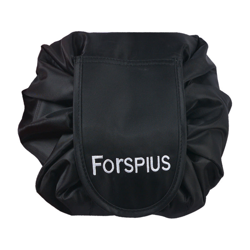 Black waterproof drawstring toiletry bag with front pouch and gathered top