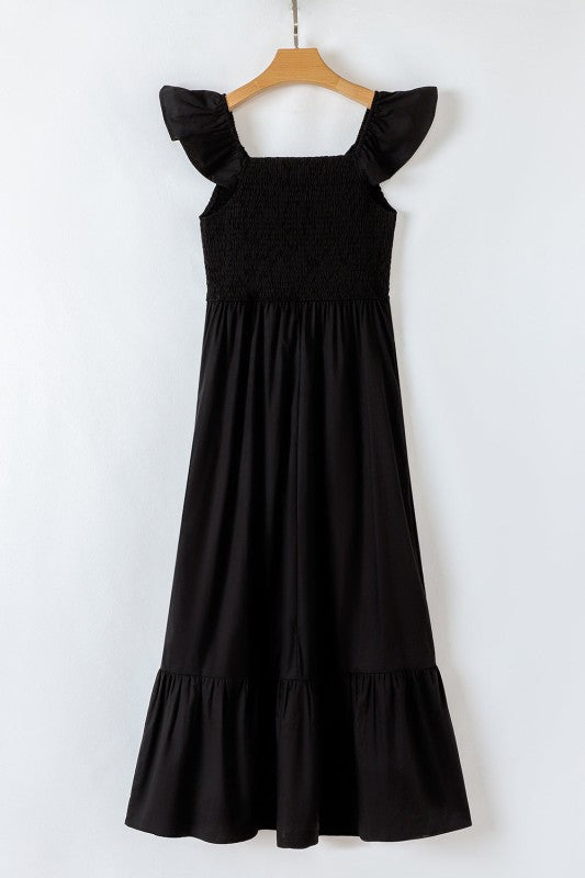 Black flutter-sleeve maxi dress with smocked bodice and gathered skirt