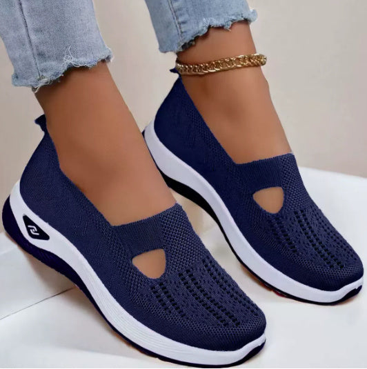 Women's mesh slip-on shoes, navy knit upper with white sole (worn)