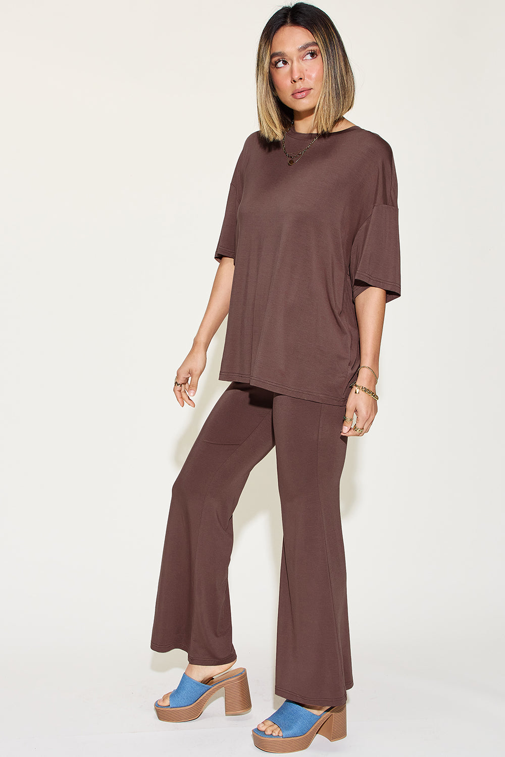 Chocolate brown drop-shoulder t-shirt and flare pants set, side view