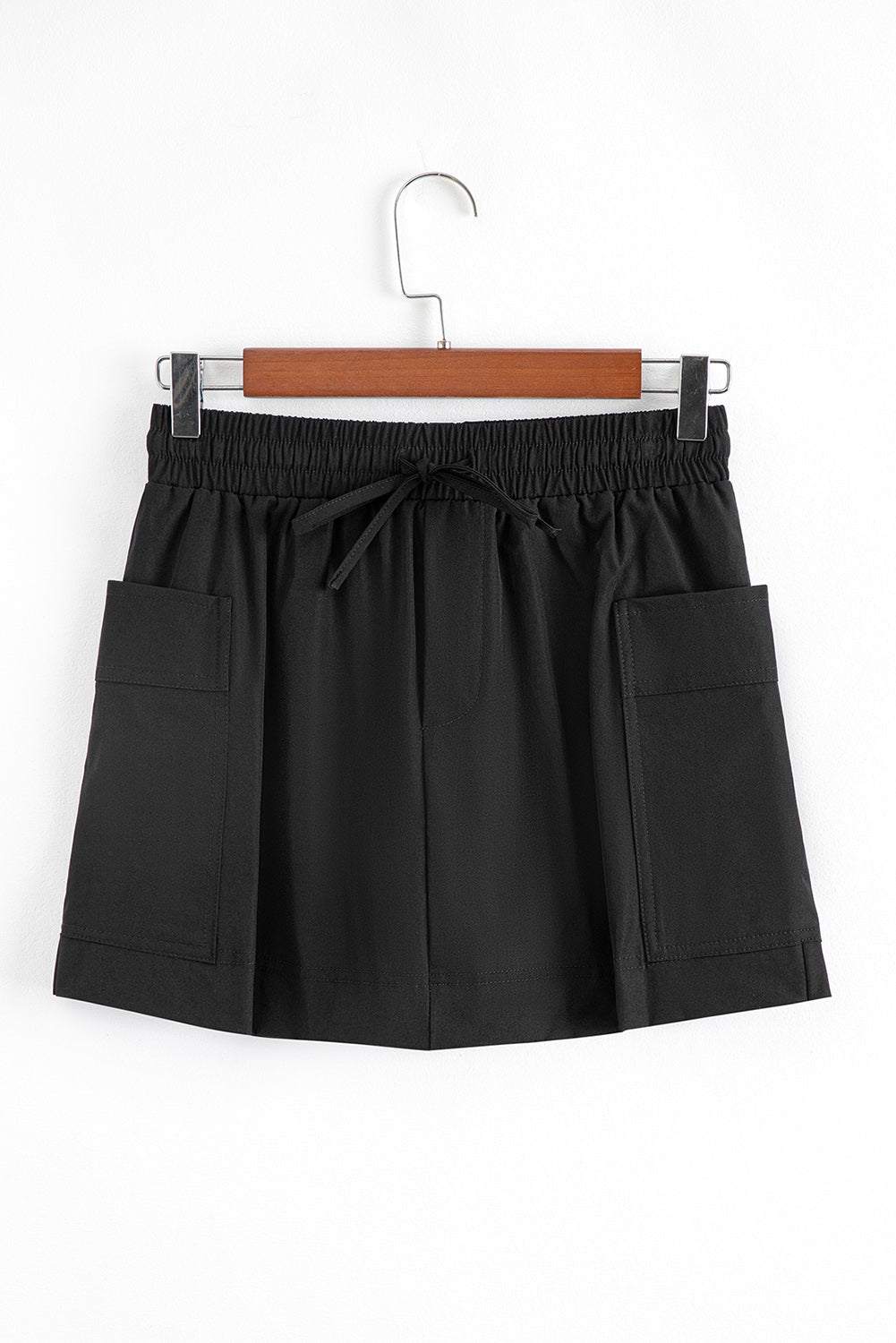 Kiera black elastic waist pocket active skort with two front cargo pockets