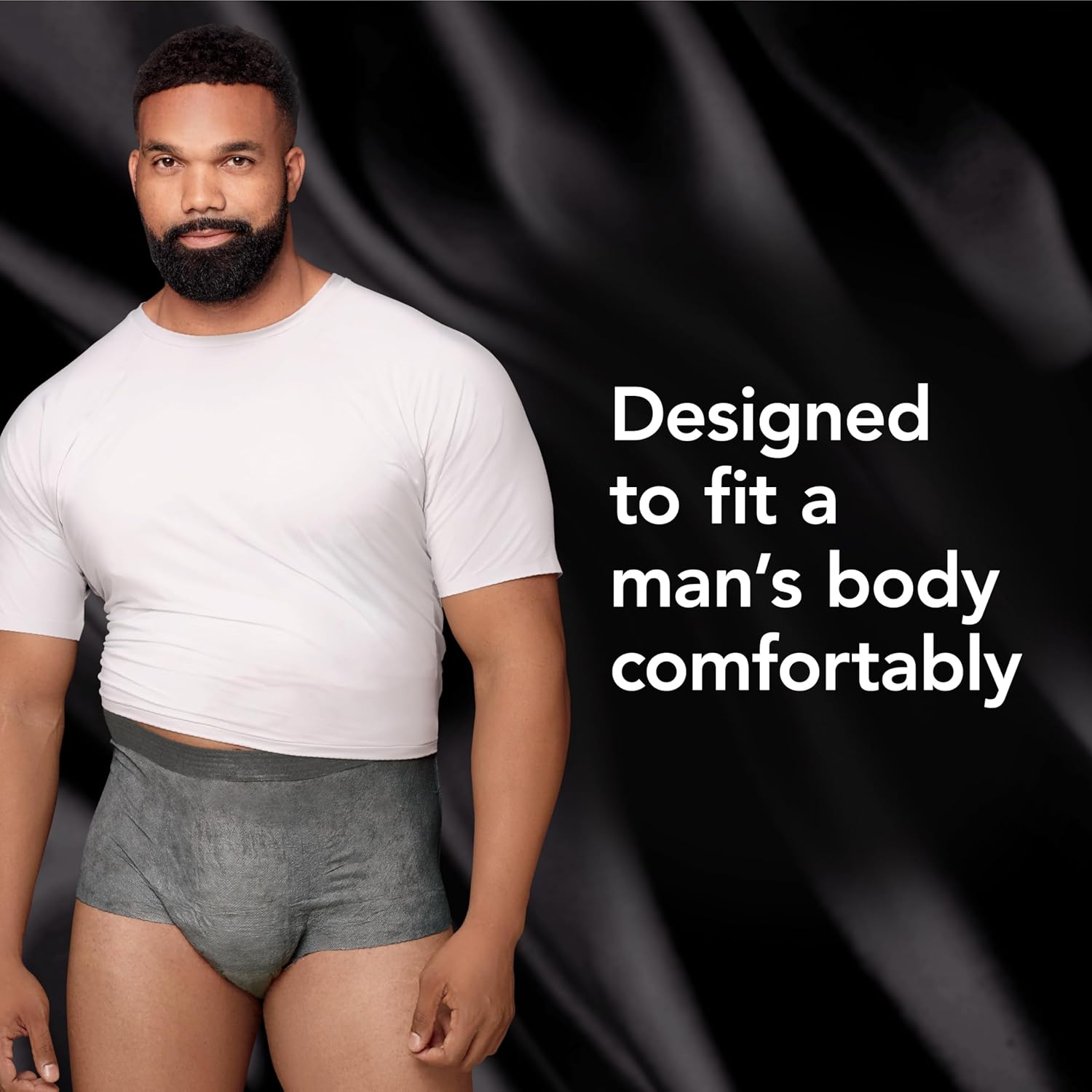 Dark gray absorbent men’s boxer briefs on body, short coverage