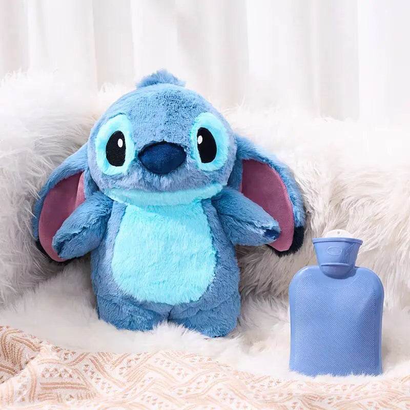 Blue plush cartoon hot water bottle with matching cap, rounded body and big eye face