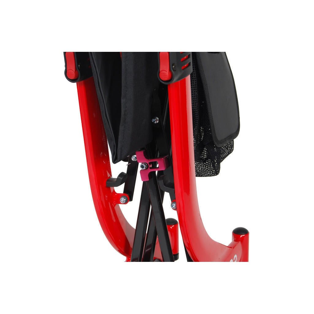 Red rollator frame close-up showing folding mechanism and support bars