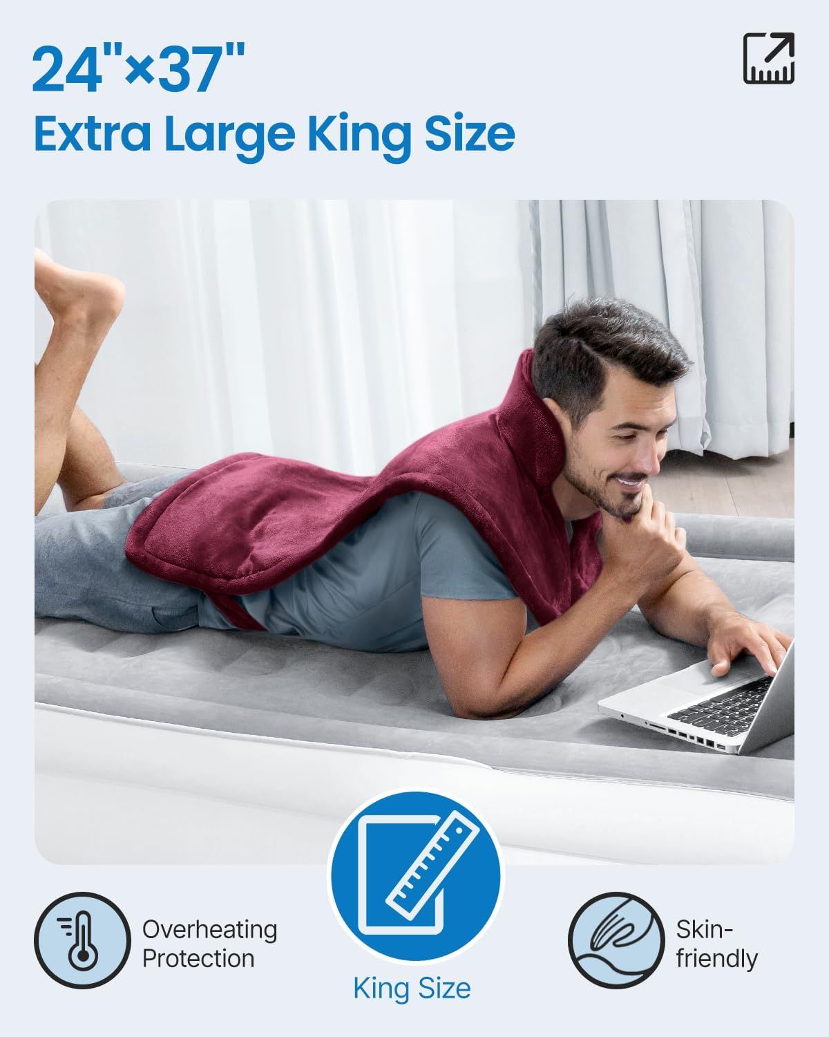 Burgundy king-size electric heating pad on a couch, used on the neck and shoulders