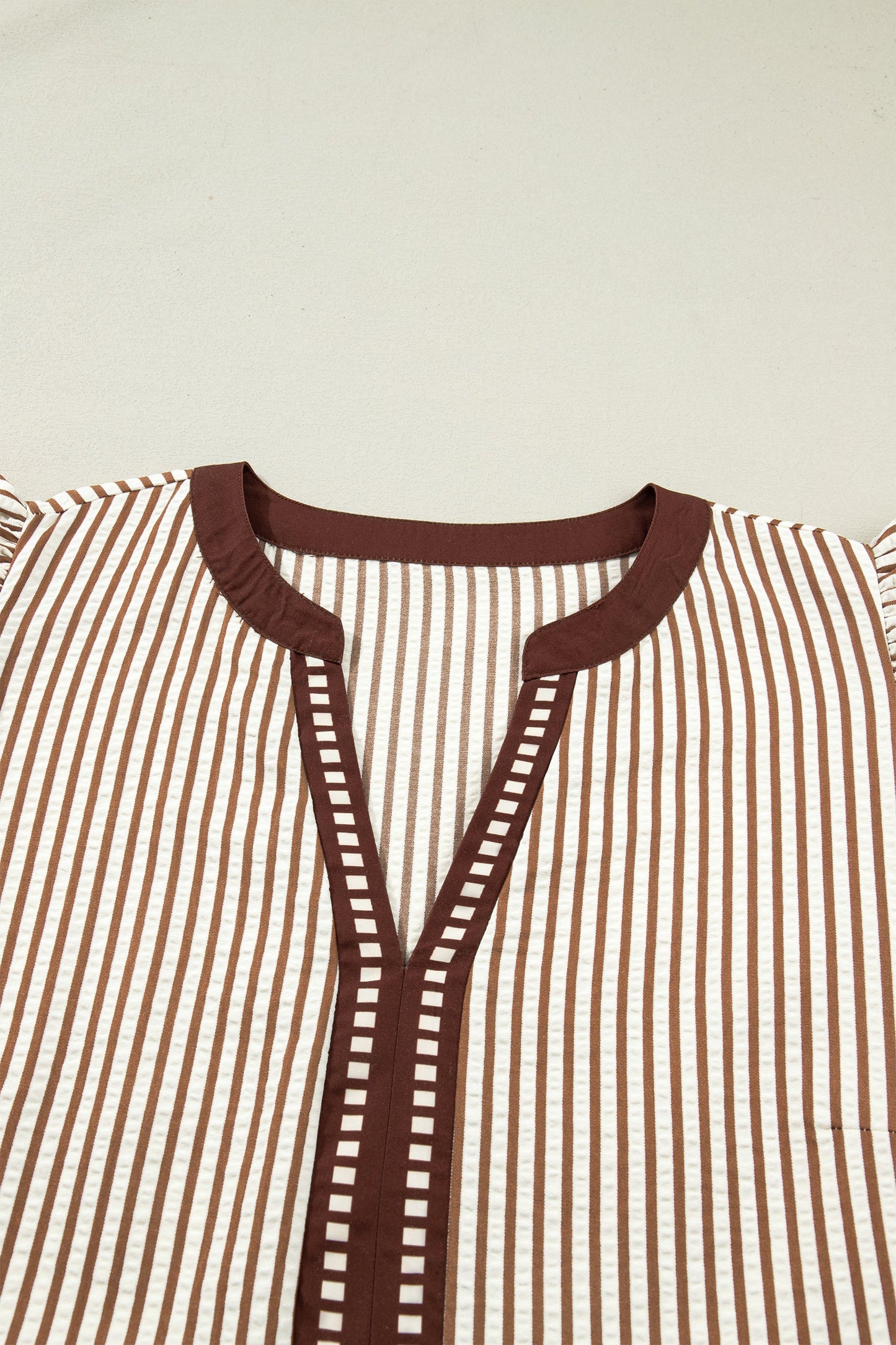 Brown-and-cream striped plus maxi dress with flutter sleeves and keyhole neckline
