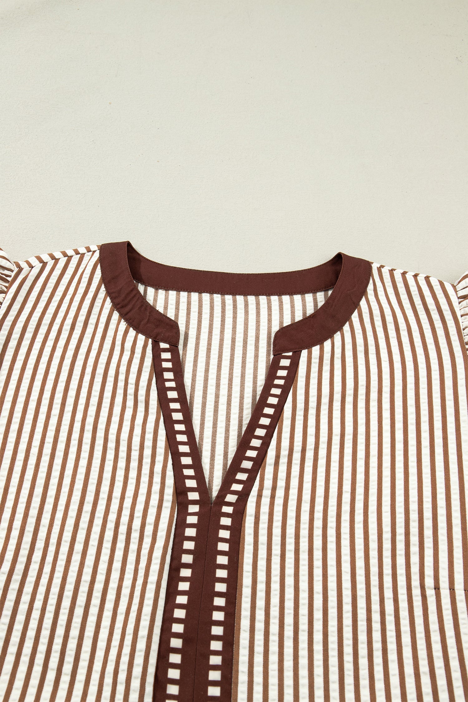 Brown-and-cream striped plus maxi dress with flutter sleeves and keyhole neckline