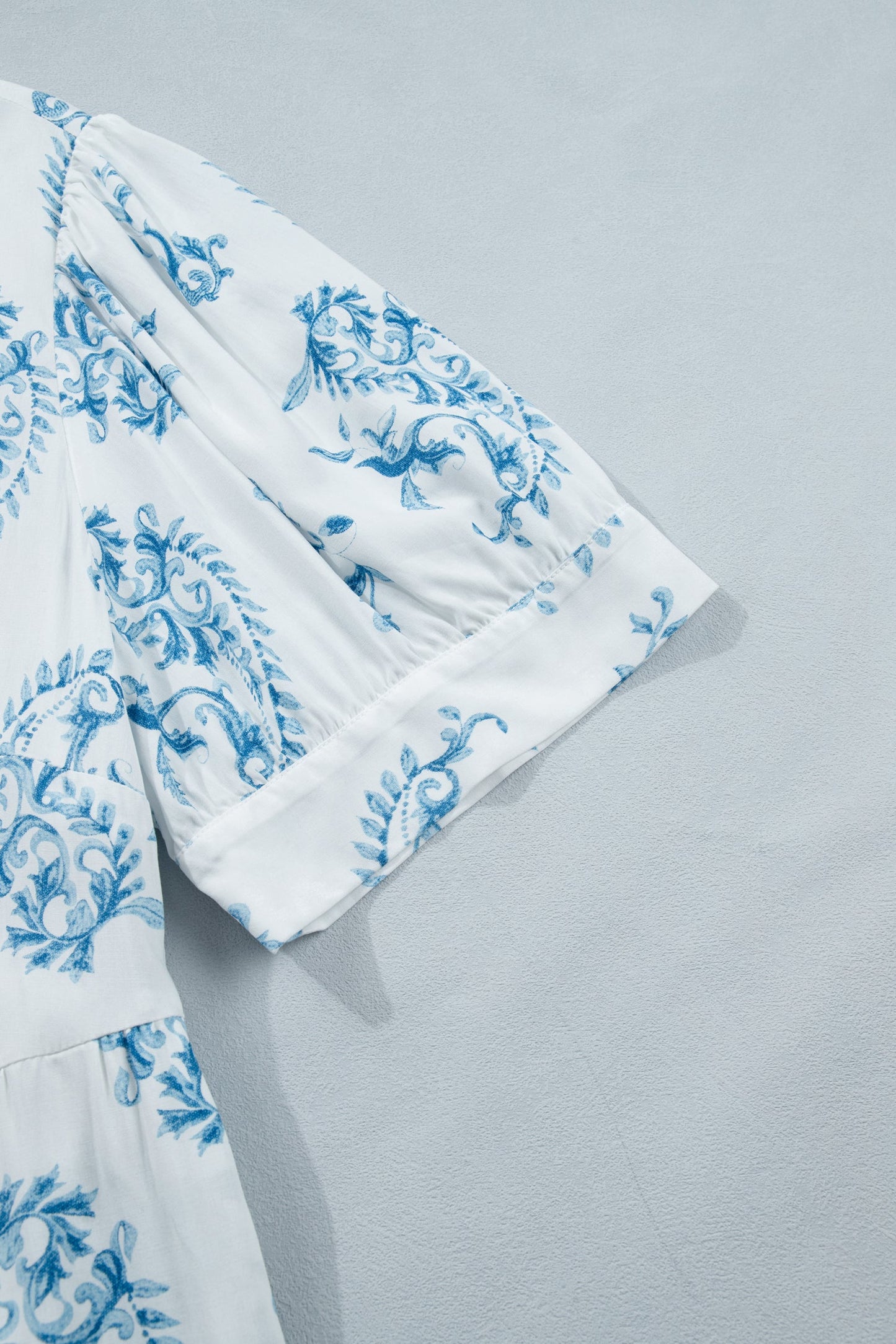 Sky blue floral maxi dress sleeve with gathered elastic cuff and pleated fold