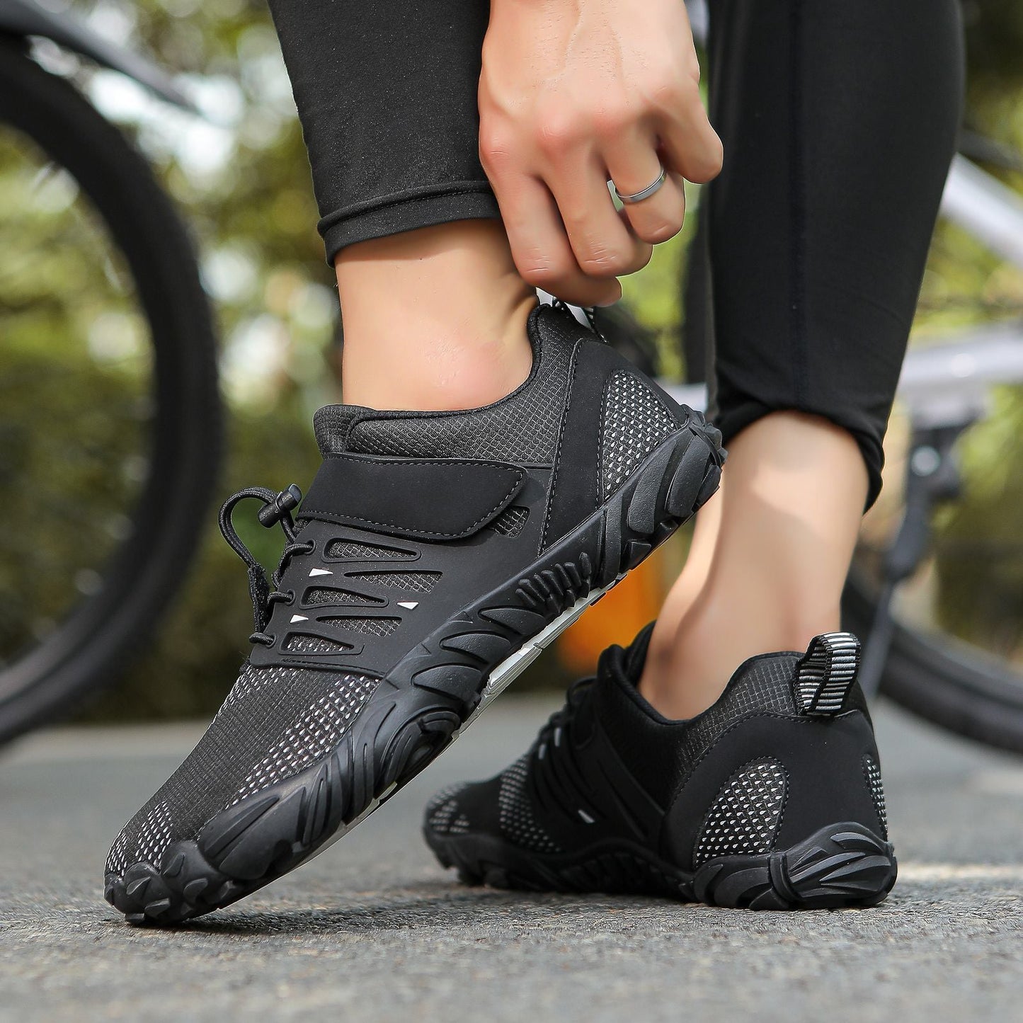 Black mesh dive water shoes with hook-and-loop strap and textured grip sole