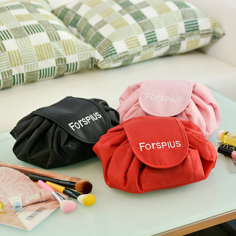 Pink and black waterproof drawstring toiletry bags with front pouches