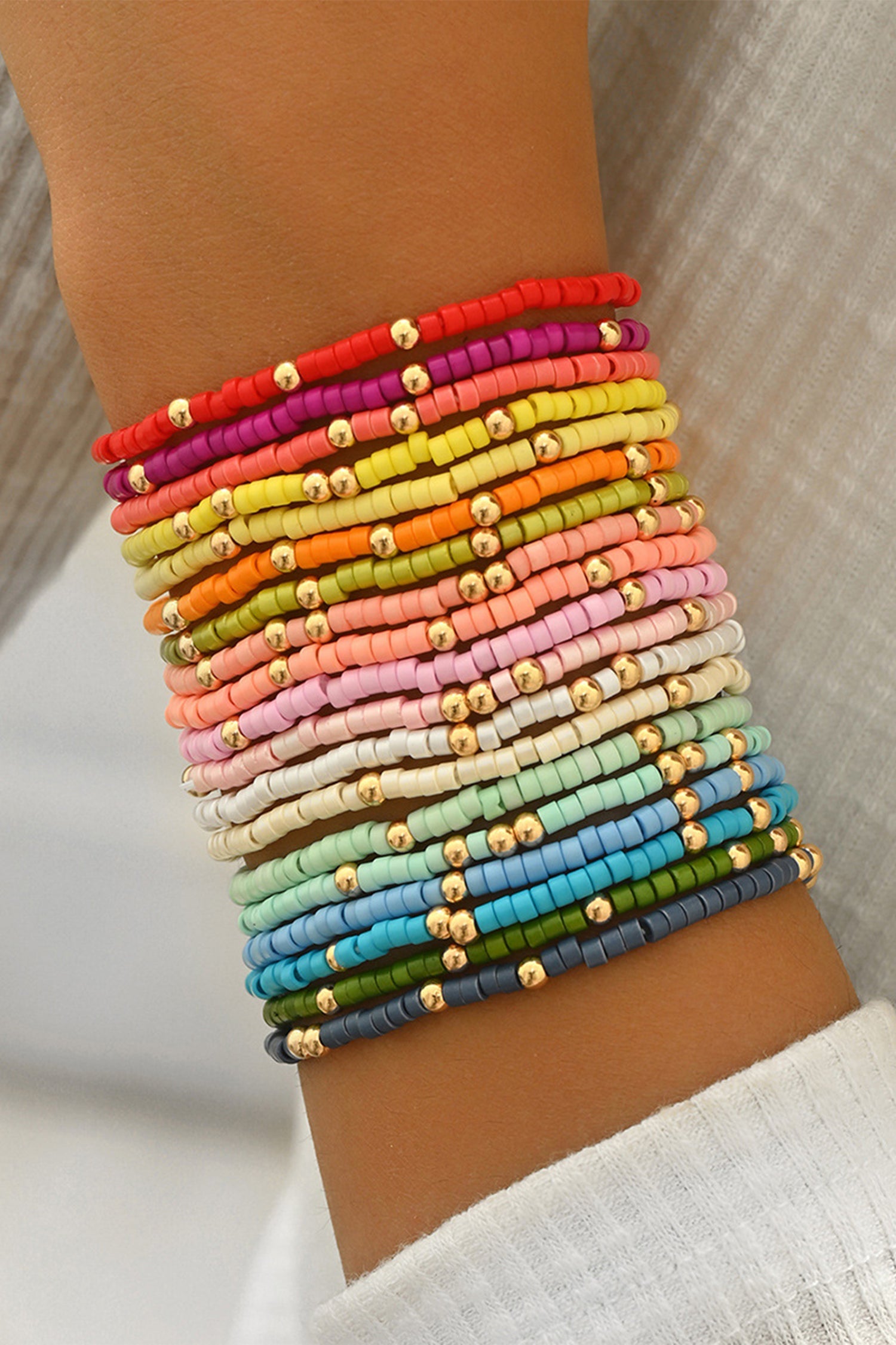 Beaded stretch bracelet set with multicolor square beads and gold-tone spacers