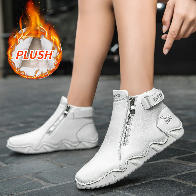 White high-top ankle boots with side zipper and cushioned lining; durable rubber sole.