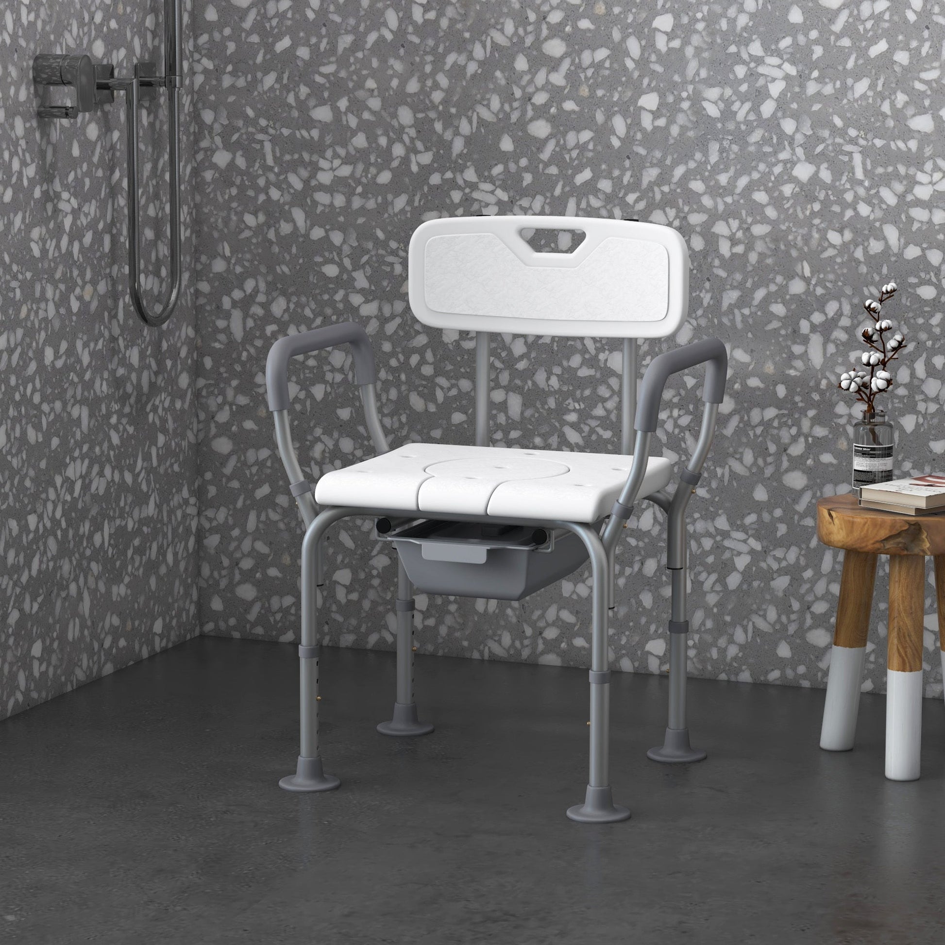 Aluminum shower commode chair with padded seat, detachable bucket, and armrests