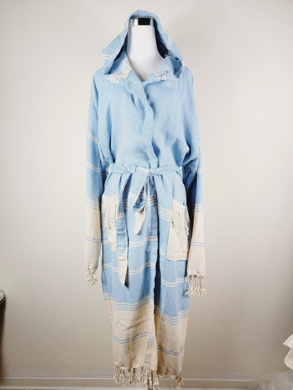 Light blue unisex hooded robe with geometric print, cream striped trim, tie belt and tassel hem
