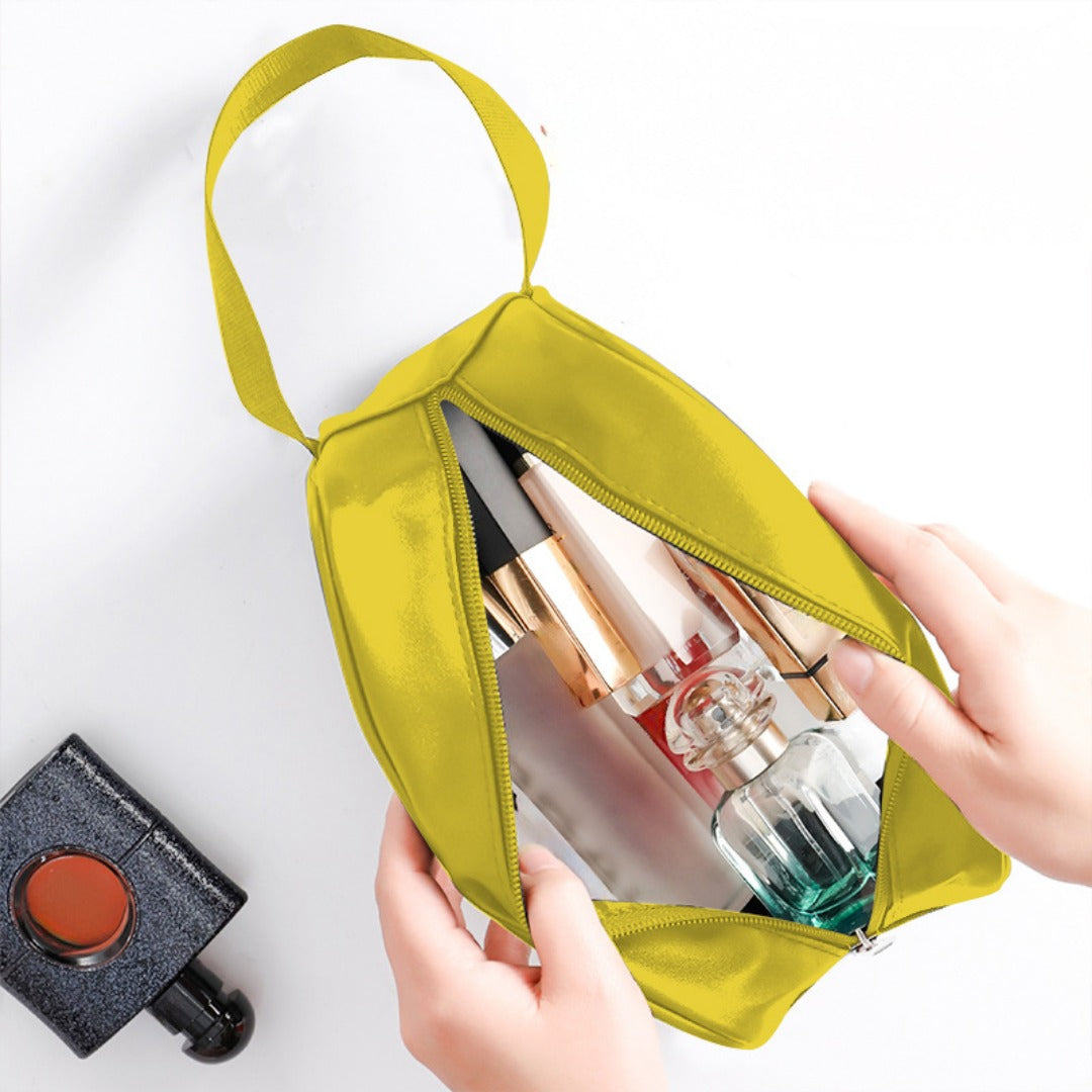 Yellow translucent toiletry bag open with zipper; shows bottles and brushes inside.