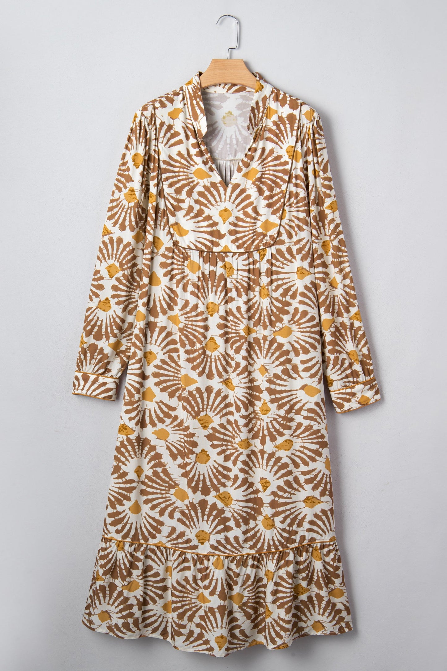 Hanging plus size long dress in khaki with gold floral swirl print, front
