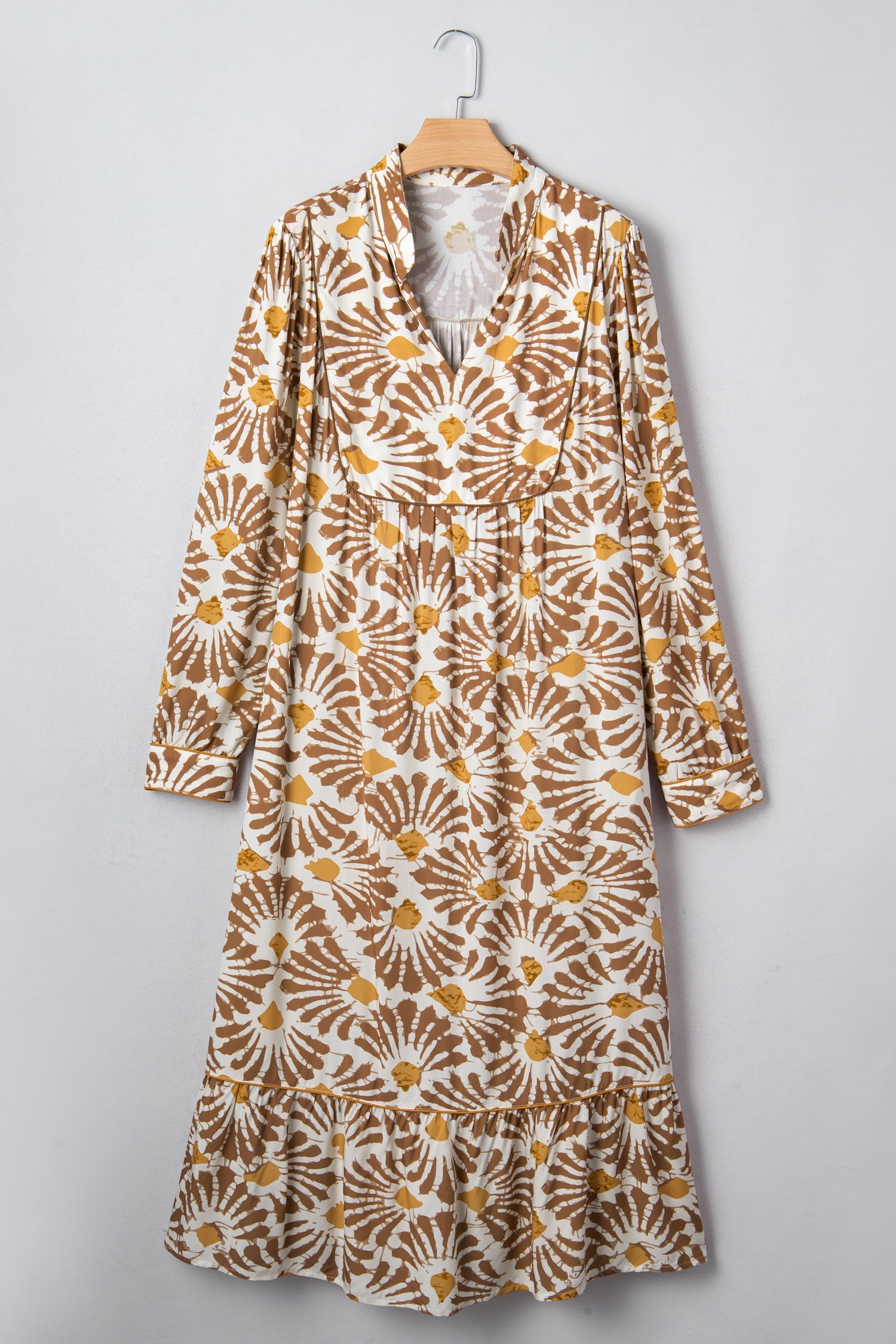 Hanging plus size long dress in khaki with gold floral swirl print, front