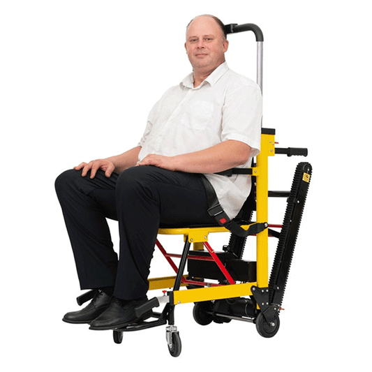 Yellow electric stair-climbing wheelchair lift with black seat and safety armrests
